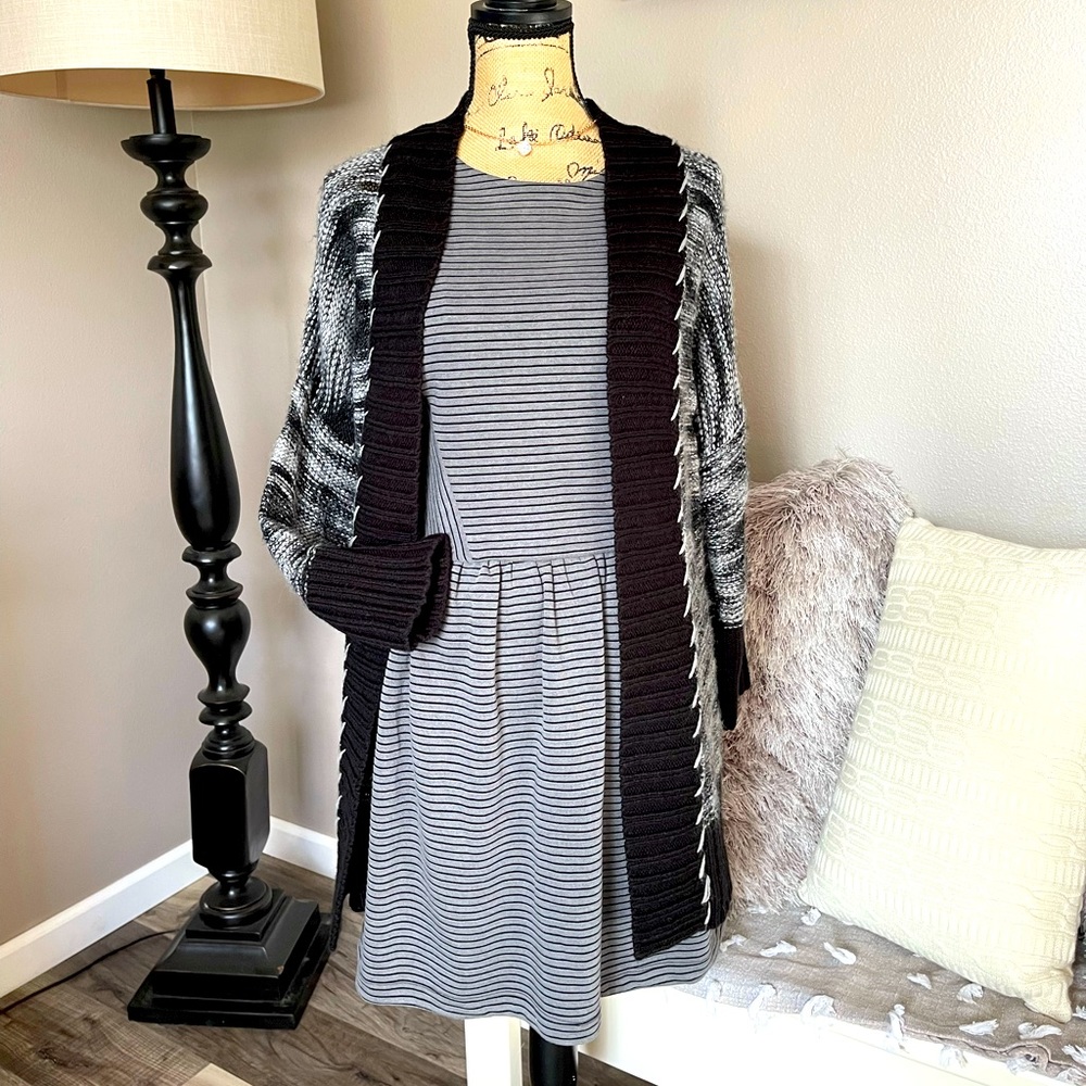 Stylish black and white cardigan sweater with fun detailed stitching!